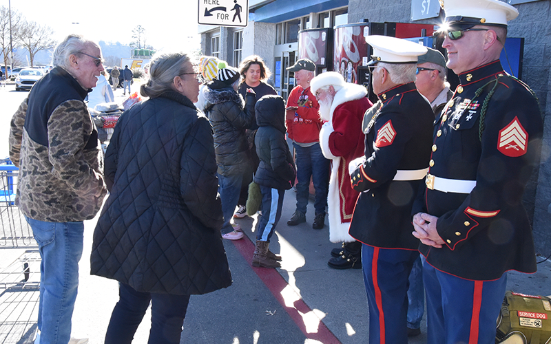 Members of Marine Corps League Detachment #1438 in Blue Ridge were joined by volunteers and Santa Claus Friday morning in front ot Walmart in Blue Ridge as part of their single largest fundraising day of the year for Toys for Tots. Events took place the same day at the Blue Ridge Depot and Grumpy Old Men Brewing. Marines visited with donors while Santa heard from many of the children who passed by.