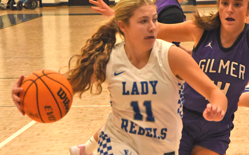 Izzie Jabaley drives for two points.