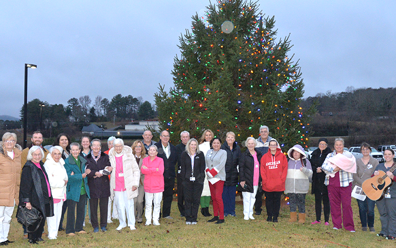 The Blue Ridge Medical Center Auxiliary, known as the Pink Ladies, gathered with hospital staff and other visitors for their annual Love Lights tree lighting outside of the hospital December 2.