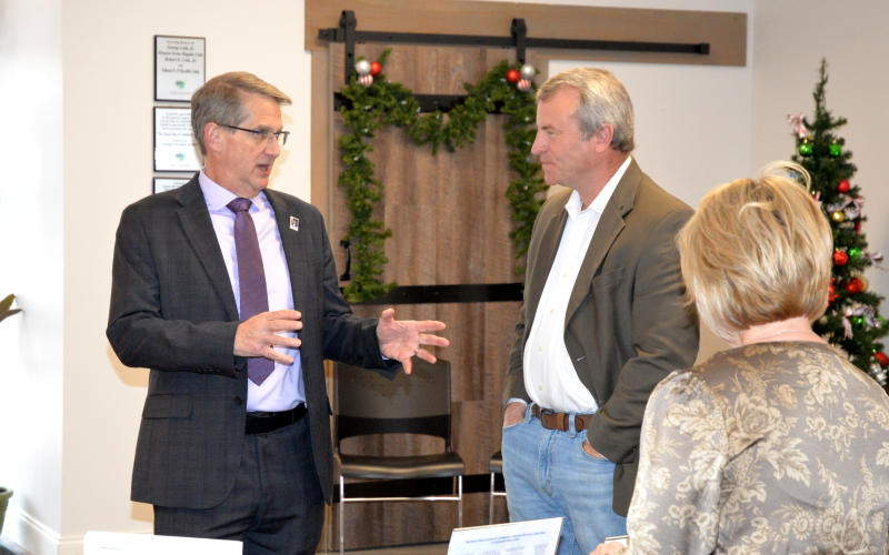 Allen Morgan, deputy assistant commissioner for the Georgia Department of Behavioral Health and Developmental Disabilities, left, and Fannin County Sheriff Dane Kirby speak prior to the Mental Health Summit.