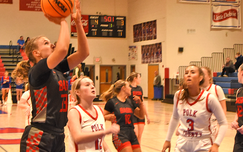 Cora Kimsey puts up two of the 18 points she scored in the Copper Basin victory over cross county rival Polk County in Benton.