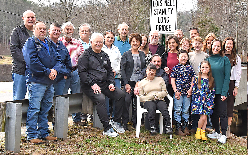 Fannin officials and members of the Lois Nell Stanley Long family gathered to dedicate the bridge over Big Creek on Aska Rd. Shown are Post 2 Commissioner Glenn Patterson, Public Works Director Zack Ratcliff, Commission Chairman Jamie Hensley, Merle and Freddy Long, Post 1 Commissioner Johnny Scearce, Robbie Long, Gerald Long,  Gina Golden, Heather Long, Shane Rogers, Rocco Rogers, Marley Rogers, Annette Long, Lyle and Cathy Scruggs, Ray, Jordan, Josh, Brody, and Erin Golden, Aly Ethington, Allison Rodgers.