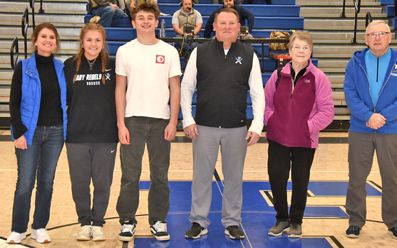 Retiring Fannin County Rebels Head Football Coach Chad Cheatham was introduced Friday night as a member of the Fannin County Sports Hall of Fame Class of 2026. Joining Cheatham for the announcement were, from left, wife, Katherine Cheatham; daughter, Annaleigh Cheatham; son, Braxton Cheatham; Coach Cheatham; mom, Barbara Cheatham; and dad, Steve Cheatham.