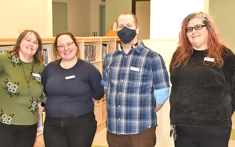Fannin County Public Library staff members, from left, Hannah Loudermilk, Madeline Pasley, Mike Lavery and McKenna Shewmake welcomed visitors to a soft opening of the new facility Tuesday, February 24.