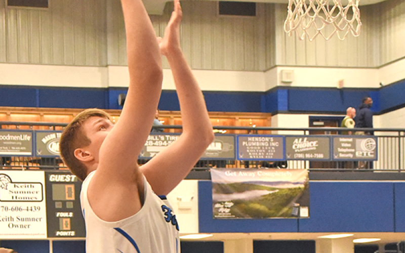 News Observer Photo/Glenn Harbison Keaton Watkins zeros in on two points in the Fannin County Sweet 16 win over the Thomasville Bulldogs.