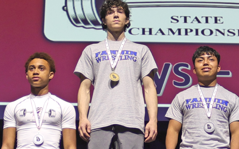 Fannin County High School 140-pound class weightlifter Troy Partain, center, took home the 2026 state championship at the Lee Murray State Weightlifting Championships March 7. Lupe Jose Valasquez, right, finished runner up in the state.