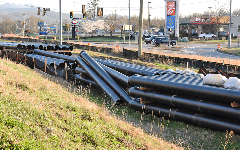 News Observer photo/Glenn Harbison Sewer pipe, along with water pipe and other materials, await the arrival of contractors and equipment at the Gateway project site.