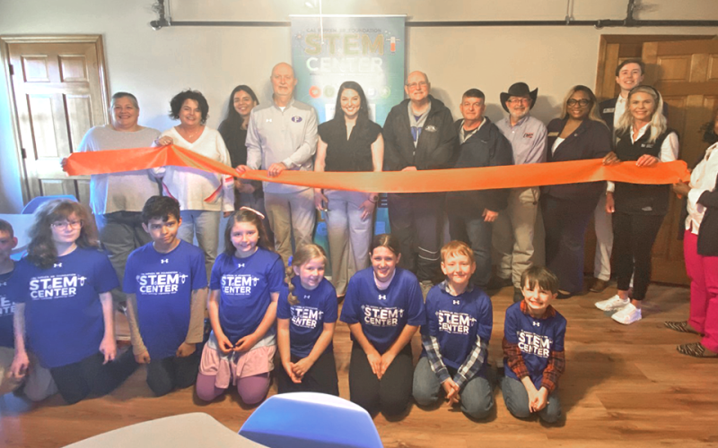 News Observer Photo/Jason Queen A ribbon cutting ceremony took place at The Cal Ripken STEM Center at the Fannin County Recreation Department in Blue Ridge on March 12. Pictured at the event were, from left, front, Parker Martin, Elisabeth Nicholson, Bradford Carpenter, Aniston Graham, Karmen Rymer, Leah Hughes, Sam Kochish, Oliver Parks; back, center assistant Carrie Wooten, Recreation Facility Manager Lorraine Panter, TVA representative Edith Perez, Fannin County Recreation Department Director Eddie O’Nea