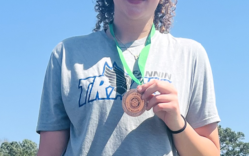 Presely Daves won a medal for her third place Discus performance at Roswell, and is ranked 21 in the event statewide.