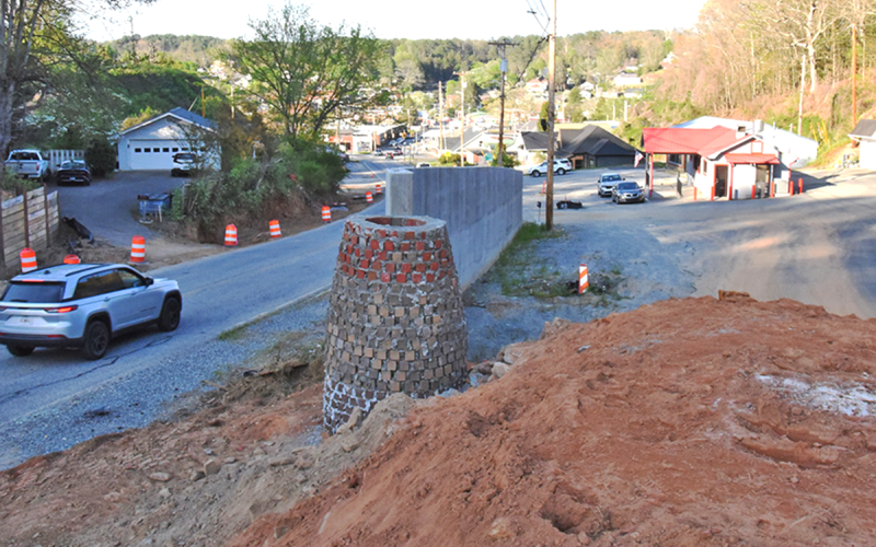 Construction was on hold for the evening last Friday, April 10, on the Blue Ridge Drive roundabout in McCaysville. This photo was taken from the highest point of where dirt has been placed so far, looking north toward Blue Ridge Drive toward the downtown area. Papa’s Pizza is seen on the right.