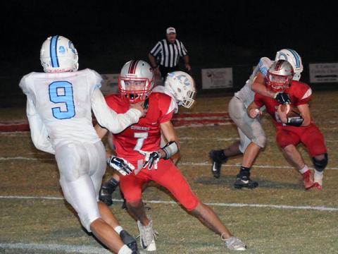Cougar Dawson Worthy (7) blocks for runningback Chance Bailey (42) in recent action for the Copper Basin.