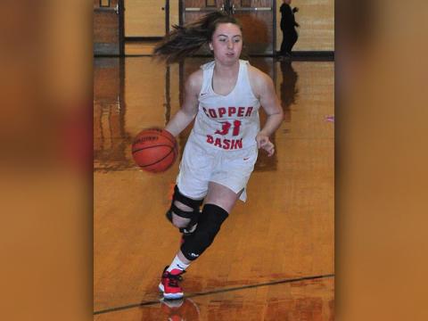 Lady Cougar Laney Jory uses her speed to get around a Nantahala defender during Copper Basin’s win over the Lady Hawks Thursday, November 21.