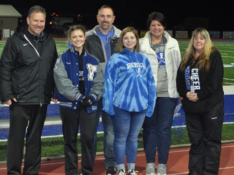 Four senior Lady Rebel cheerleaders were recognized at Fannin County’s senior night Friday, November 8. Shown are, from left, senior Morgan Mull, Michael Mull, father; Madison Mull, sister; and Betsy Mull, mother.
