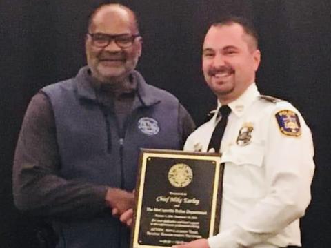 McCaysville Police Chief Michael Earley, right, is shown receiving an award from Allen Poole, director of the Georgia Governor’s Office of Highway Safety.