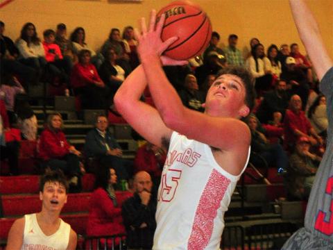 Copper Basin Cougar Tim Jabaley goes up for a contested layup during the Cougars game against the Chattanooga Patriots Thursday, December 12.