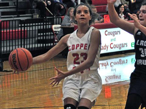 Senior Lady Cougar Hailey Brackett goes up for a score in recent action for Copper Basin.