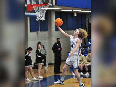 Fannin Rebel Cohutta Hyde goes up uncontested during a fastbreak in recent action for the Fannin County Rebels basketball team.