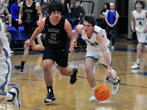 Jordan Bennett runs a fast break against Union County Saturday, December 7. Fannin County was able to hold off Union County to win the game 53-51.