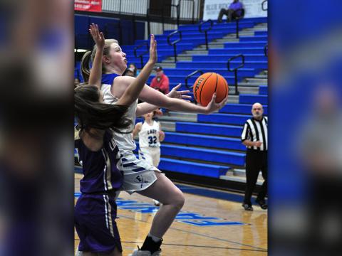 Lady Rebel Morgan Holt goes up for a contested layup during Fannin’s region win over Lumpkin Count Tuesday, December 10.