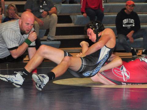 Fannin Rebel Cooper Moreland works his opponent in recent action for the Rebels wrestling team.