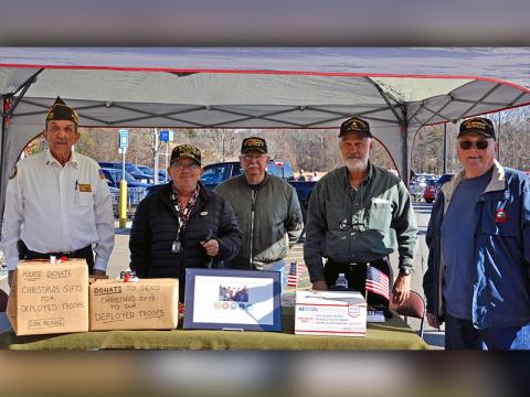 Local veterans, from left, Fannin County VFW Post 6570 Commander Richard Pierce, Charles Spivey, Rod McIntyre, Steve Strickland and Chuck Morris raise funds to send Christmas gifts to deployed troops Saturday, December 7.