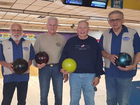 Golden Club Bowling League completed their Fall League, Wednesday, December 18, and at the banquet the following winners were declared: Handicap series, Bob Rodde with a 768 and Linda McKee with a 762; Handicap game, Larry Dumas with a 723 and Claudia Parks with a 300; Most improved bowler, Buddy Collins and Linda Beldowski; High Average, Chris McKee with a 202 and Bonna Graham with a 147. Shown are, from left, Dumas, Collins, Billy Acton and Rodde.