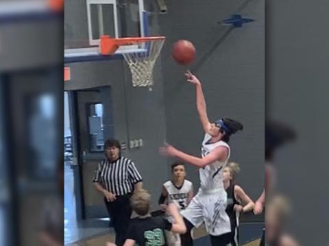 Fannin County Middle School Rebel Colton Gray goes in for a layup in the Rebels matchup with Pickens County.