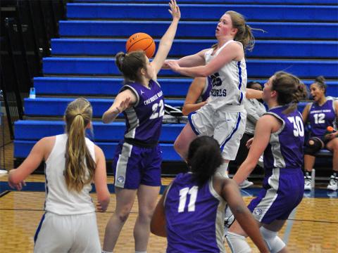 Lady Rebel Morgan Holt goes up for a contested layup in recent action for the Fannin County Lady Rebels basketball team.