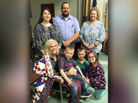 Homestead Hospice of Blairsville presented Earlyne Simmons with a Quilt of Valor for her service in the U.S. Marine Corps during the Vietnam Era Friday, January 31. The ceremony was held at the Fannin County Senior Center, where she was surrounded by her family; son and daughter-in-law, Shaun and Tara Simmons; grandchildren, Della, Shaun Jr. and Michael; and relative, Debbie Simmons.    	  