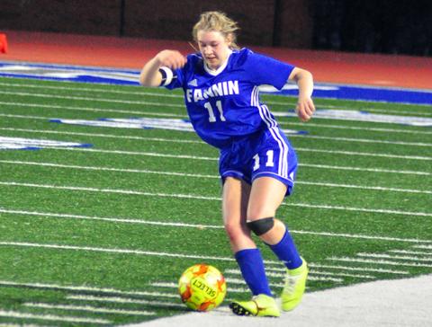 Lady Rebel Sydnie Jones keeps the ball away from a Dragonette defender during Fannin’s matchup with Pickens County Tuesday, March 3.