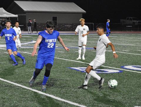 Fannin Rebel Garrett Mervine makes a play on the ball in recent action for the Fannin County Rebel soccer team.