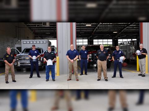 Wild Side, LLC. constructed protective hard hats for Fannin County Emergency Management Agency. The hard hats feature a shield that can be sanitized after each use and can be re-used. Shown are, from left, Fire Chief Larry Thomas, Paramedic Joey Cox, Wild Side, LLC. Owner Dale Evanson, Diamond Mobile Advertising Co-owner Justin Nicholson, Paramedic Dale Stiles, EMA Director Robert Graham, Firefighter Channing Johnston and EMA Deputy Director Darrell Payne.