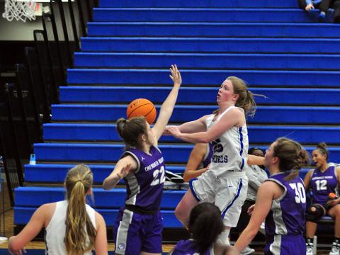 Lady Rebel Morgan Holt goes up for a contested layup this past season for the Fannin County Lady Rebels basketball team.