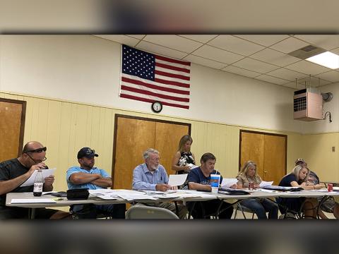 Polk County commissioners unanimously voted to pass a resolution Thursday, June 25, requesting an action plan from the Tennessee Wildlife Resources Agency (TWRA) to correct issues the county is currently facing. Shown are, from left, commissioners John Hoyt Pippenger, Jeremy Kimsey, James Woody, County Clerk Jackie Rogers (back), Dewey Esquinance, Debbie Davis, Samantha Trantham and Greg Brooks.