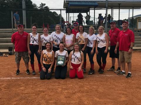 The Lady Rebels travel softball team won the World Series in Cleveland, Tennessee, Saturday, June 25 through 28. Shown, following the victory, are, from left, front, Riley Smith (Copper Basin), Payton Palmer (Hiwassee Dam) and Kaitlyn Goode (Copper Basin); middle, coach David Goode, Rylie Payne (Hiwassee Dam), Lauren Brooks (Hiwassee Dam), Allison Stiles (Hiwassee Dam), Carly Curtis (Andrews), Sydney Payne (Hiwassee Dam), Ansleigh Hogsed (Murphy), Riley Dockery (Murphy), head coach Mark Brooks and coach Sha