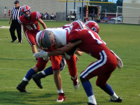Copper Basin Cougar Dawson Worthy (7) catches a pass on a slant for a touchdown during the Cougars 28-19 victory over Polk County Friday, August 21.