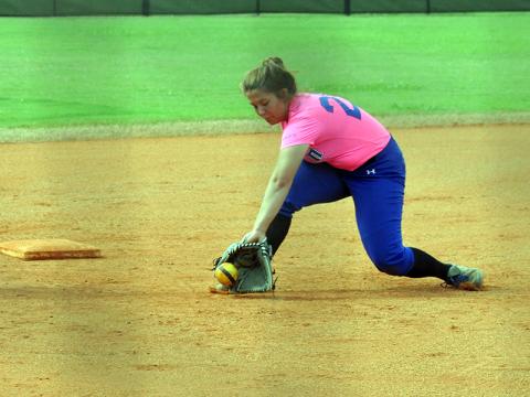 Lady Rebel Chelsey Fyre stops a ground ball in recent action for the Fannin County Lady Rebels softball team.