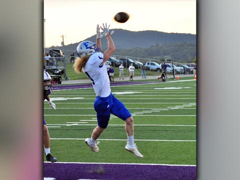 Fannin Rebel Cohutta Hyde (4) snags a touchdown pass on a slant to give the Rebels a 7-0 lead against Union County Friday, September 4.