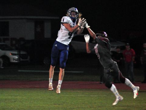 Cohutta Hyde (4) hauls in a catch for a big gain during the Rebels 48-0 win against the Southeast Whitfield Radiers Friday, September 25.