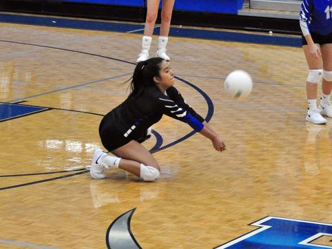 Lady Rebel senior Prisila Bautista keeps a volley alive in the Lady Rebels varsity volleyball win over Copper Basin Thursday, September 10.
