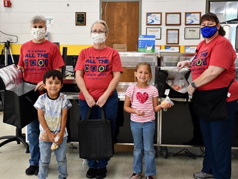 West Fannin Elementary School’s School Nutrition Program is able to distribute different fruits and vegetables as school snacks thanks to the United States Department of Agriculture’s Fresh Fruit and Vegetable Program. Shown are, from left, Nutrition Manager Amy Hawkins, student Liam Espinoza-Olvera, nutrition staff member Doris Towe, student Khloe Lee and nutrition staff member Lisa Payne.