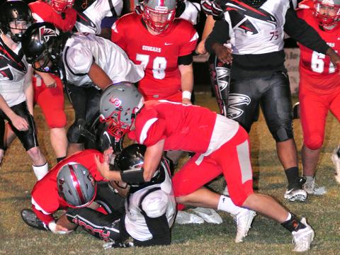 Cougars Timothy Fair (33) and Timothy Jabaley (5) stop a Falcons runner in Copper Basin’s 12-7 win over North Georgia Friday, October 16.