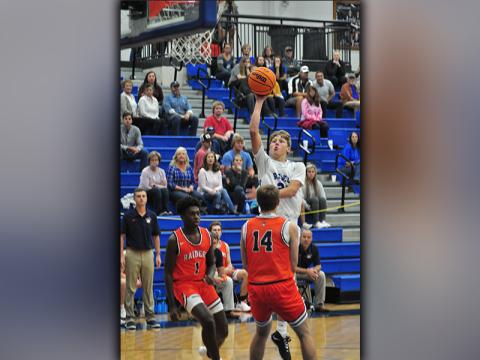Fannin Rebel Landon Norton shoots a floater over a Raider defender during the Rebels’ preseason game against Habersham County Thursday, November 12.