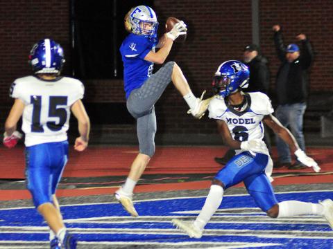 Rebel Cohutta Hyde (4) pulls down a touchdown pass from Luke Holloway in Fannin’s 42-7 win over Model Friday, October 30.