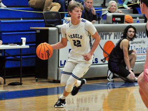 Rebel Landon Norton looks for the open man in a fast break during the Rebels 50-49 win over Union County Saturday, December 12.