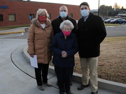 Sarah Lanning, a veteran member of the Fannin Regional Hospital Auxiliary, was not stopped in her determination to attend the annual Love Light Tree ceremony. Lanning, front, is shown with, from left, Lanning’s daughter, Becky Guthrie, Chief Financial Officer Geoff Blomeley and Chief Executive Officer Jason Jones.