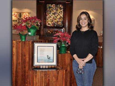 Blue Ridge Mountains Arts Association (BRMAA) Executive Director Nichole Potzauf stands proudly beside a hard-earned Governor’s Award for the Arts and Humanities, which BRMAA had the honor to accept.