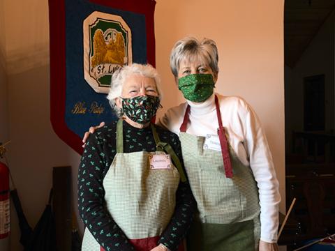 St. Luke’s Christmas Bazaar volunteers Lauren, left, and Theresa greeted attendees as they entered the church to find unique items for sale Saturday, December 5.