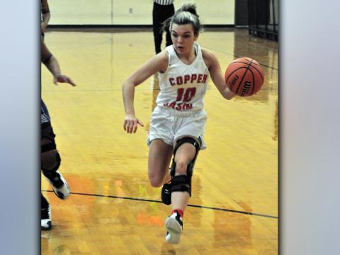 Lady Cougar Sydney Hickey drives to the basket in recent action for Copper Basin.