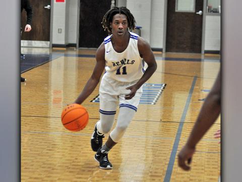 Andre Bivens attacks the basket in recent action for the Fannin County Rebels.